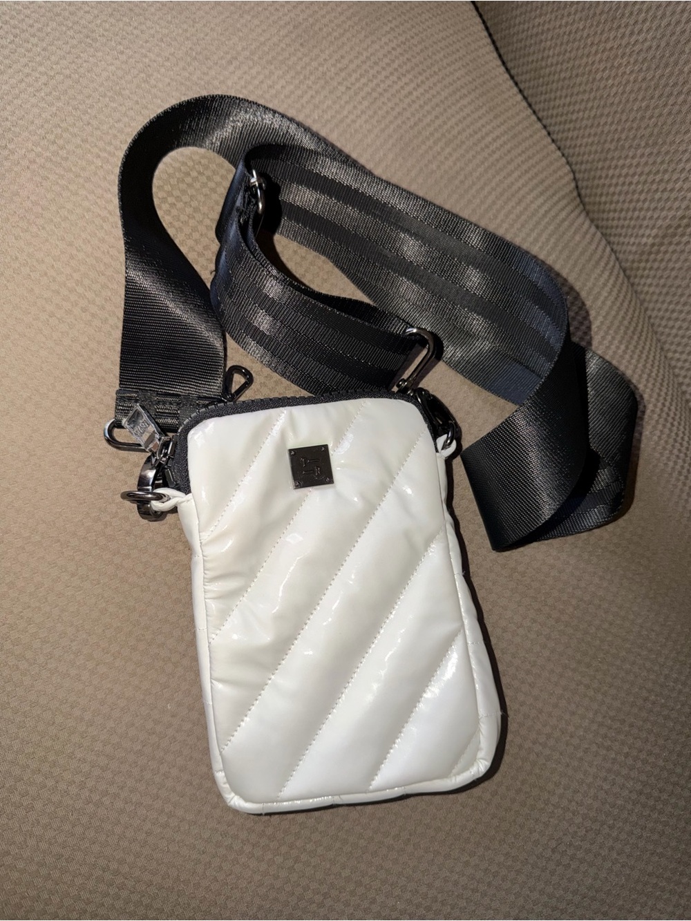 Think Royln Cell Phone Bag. Crossbody, Adjustable Black Strap. White. Never Used